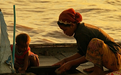 southeast asian children on a boat